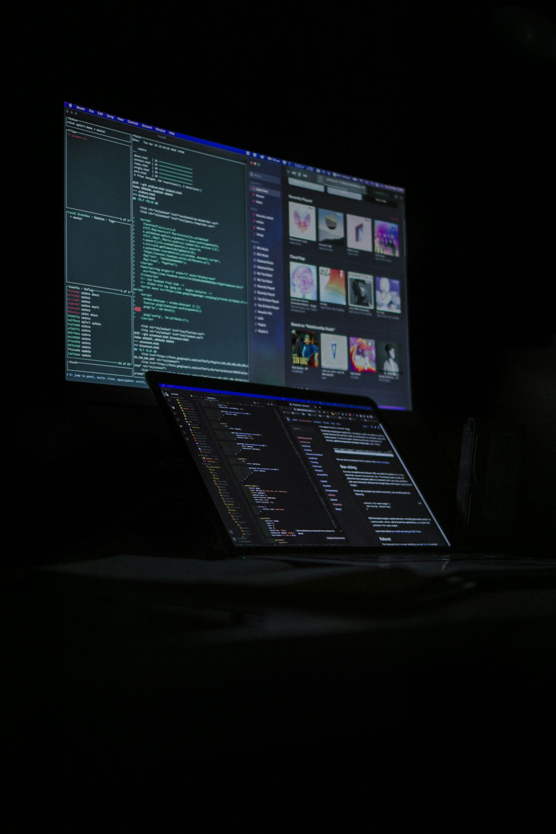a laptop computer sitting on top of a desk